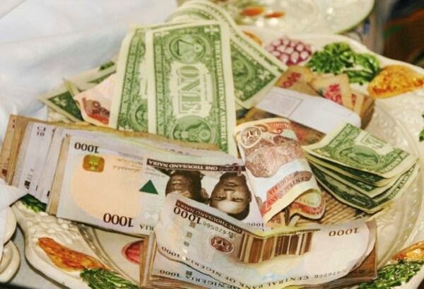 Naira now exchange for N364 to a dollar Budgeting Tips Money currency racketeering