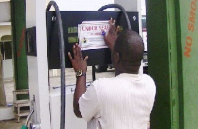 FILE: DPR official seals a petrol station in Akwa Ibom