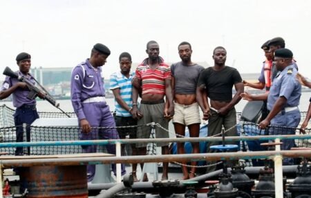 FILE: Some illegal oil bunkerers paraded by the Nigerian Navy