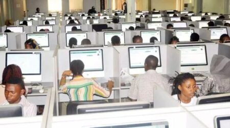 Cross section of students writing JAMB examination