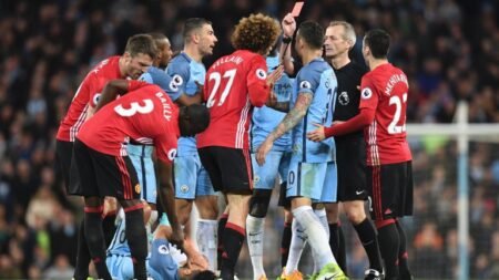 Maroune Fellaini shown the red card for headbutting Aguero