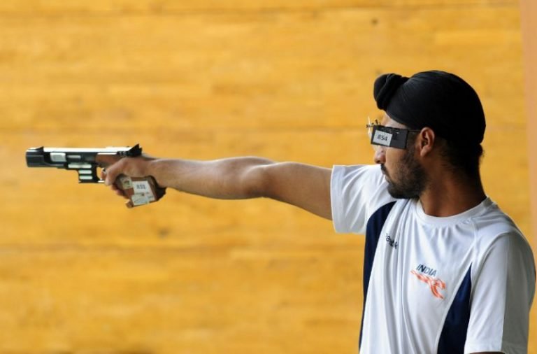 India's national shooting team, including Commonwealth Games gold medallist Gurpreet Singh, have been forced to spend the day at an airport after customs officials refused to allow them back into the country carrying guns and ammunition (AFP Photo/Raveendran)