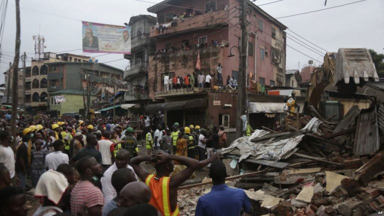 Rescue workers search for survivors amid the rubble of a collapsed building