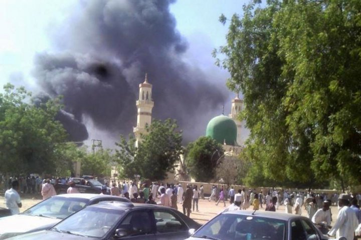 FILE: A burning mosque in northern Nigeria State of Kano Kaduna
