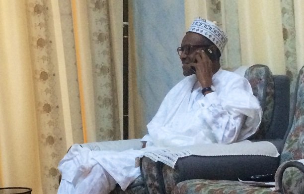 President Muhammadu Buhari receives a phone call Telephone