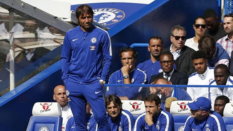 Antonio Conte watches from the touchline after going 3-0 down during the EPL football match between Chelsea and Burnley at Stamford Bridge in London on August 12, 2017.