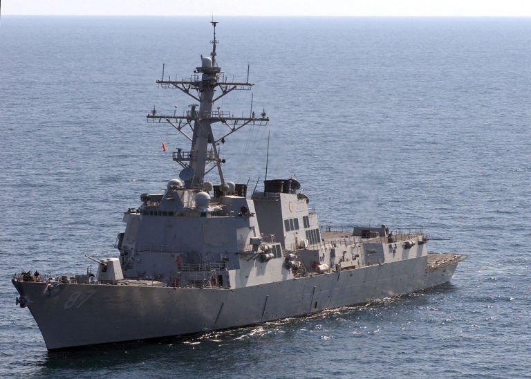 The guided-missile destroyer USS John S. McCain approaches the aircraft carrier USS George Washington for a fueling at sea