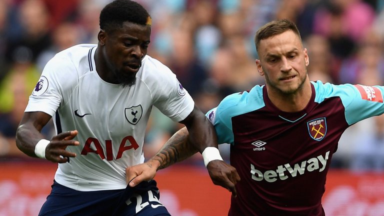 Serge Aurier (left) has rejected a move to Tottenham