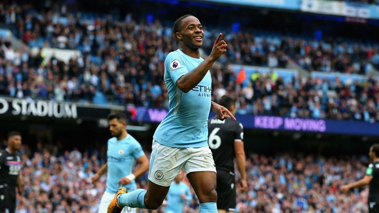 Raheem Sterling of Manchester City celebrates scoring one of his two goals