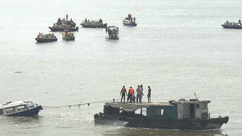 The woman removed her life jacket and jumped into the river