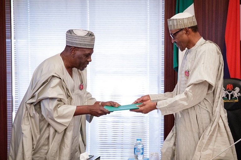 FILE: President Muhammadu Buhari receiving a report of the Presidential Review Panel on the National Intelligence Agency (NIA) from Chairman of the Panel Amb. Babagana Kingibe on 20 December 2017