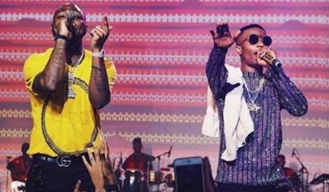 FILE: Wizkid and Davido shared the stage at #WizkidTheConcert in Lagos, Nigeria