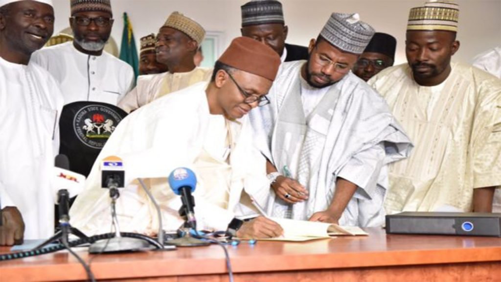 Gov. Nasir El-Rufai signing the budget into law. Photo: NAN