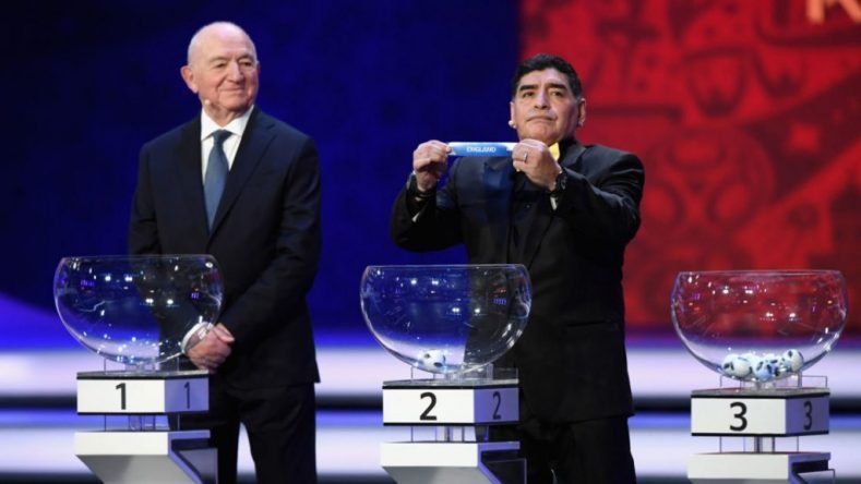 Diego Maradona draws England during the Final Draw for the 2018 FIFA World Cup Russia at the State Kremlin Palace on December 1, 2017 in Moscow,