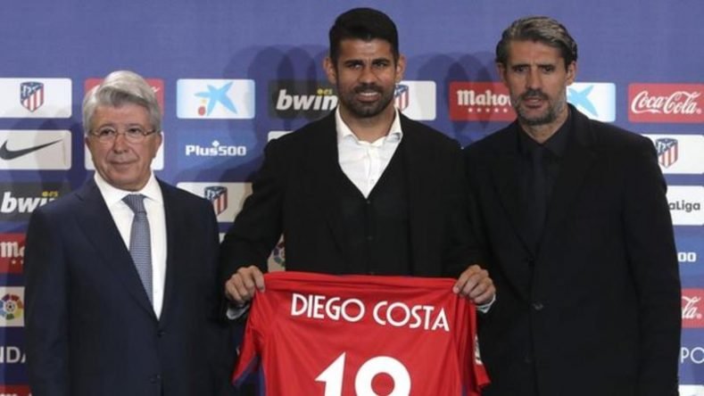 Diego Costa was presented by Atletico President Enrique Cerezo (left) and Sport Director Jose Luis Perez Caminero