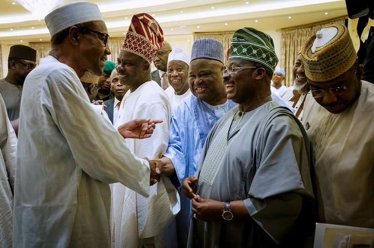 President Buhari having a chat with the governors after the meeting
