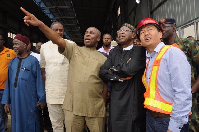 Chairman, Board of Nigeria Railway Corporation, Mr. Usman Abubakar; Minister of Transportation, Mr. Rotimi Amaechi; Minister of Information and Culture, Alhaji Lai Mohammed, and the Deputy Production Manager of the China Civil Engineering and Construction Corporation (CCECC), Mr. Xih Lijun, during the inspection of ongoing construction of the Lagos-Ibadan standard gauge rail line in Papalanto, Ogun State, on Tuesday