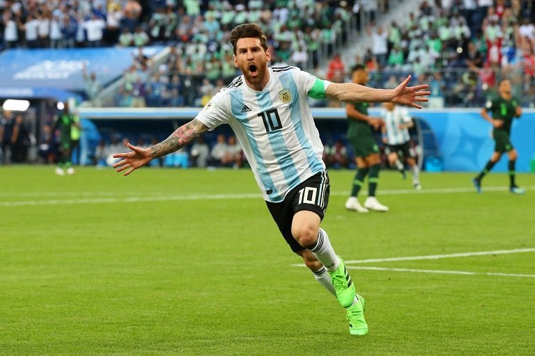 FILE PHOTO: Lionel Messi wheels away after scoring his first World Cup goal against Nigeria