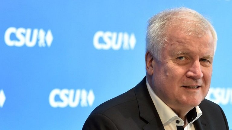 German Interior Minister and Bavarian Christian Social Union (CSU) politician Horst Seehofer may resign after disagreeing with Angela Merkel's immigration policy. AFP PHOTO