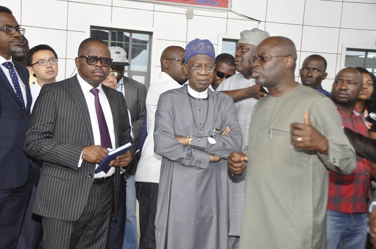 Minister of Information and Culture, Alhaji Lai Mohammed (middle); Special Assistant 1 to the President on Information and Culture, Mr. Segun Adeyemi (left) and the Secretary Transport Secretariat of the Federal Capital Territory Administration, Mr. Kayode Opeifa, during a facility tour of the Abuja Light Rail Project by the minister on Thursday