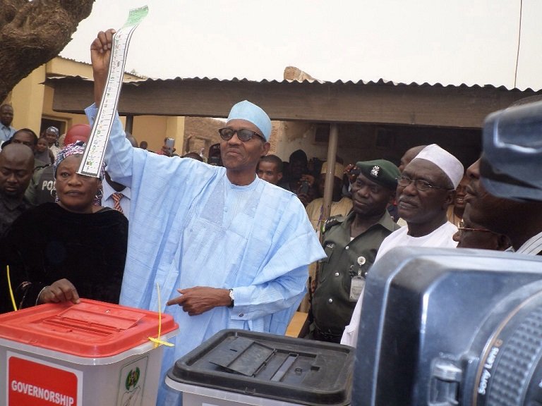 FILE: President Muhammadu Buhari casting his vote