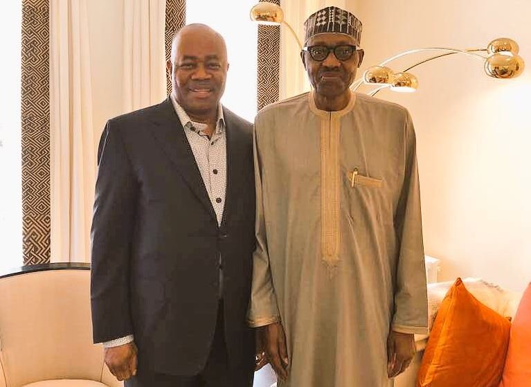 Niger Delta Minister Godswill Akpabio and President Muhammadu Buhari