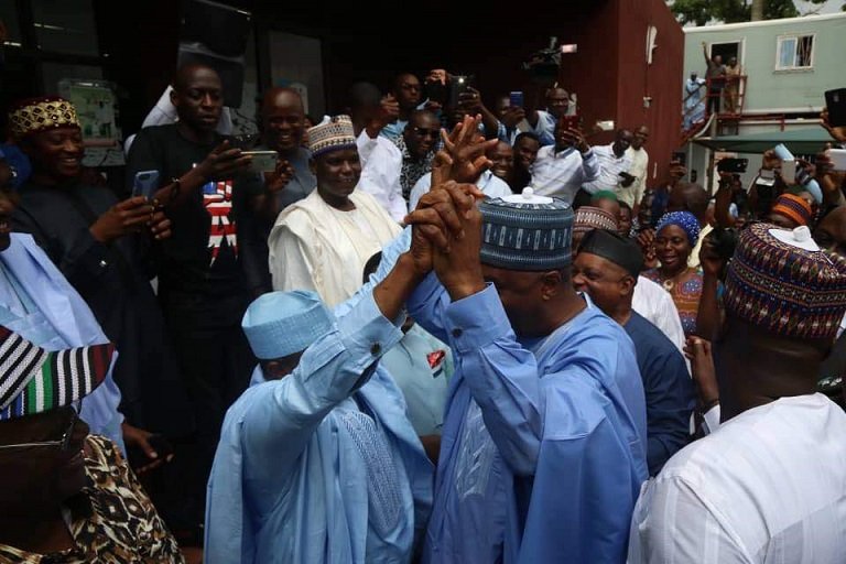 Senator Bukola Saraki and Governor Aminu Tambuwal in warm embrace