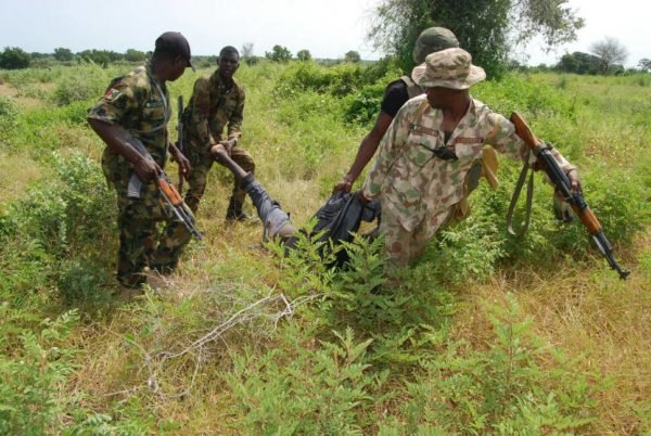 FILE: A Boko Haram terrorist killed by Nigerian troops retrieved from the bush