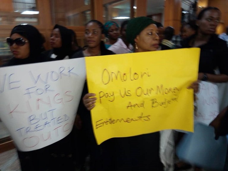 Legislative aides protest the non payment of salaries and allowances