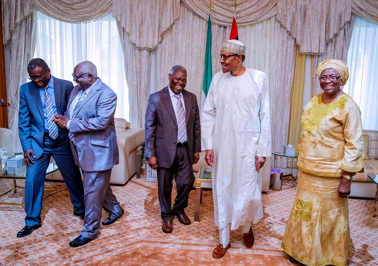 President Buhari shares a joke with Pastor Kumuyi and his wife Esther during their visit to the Presidential Villa