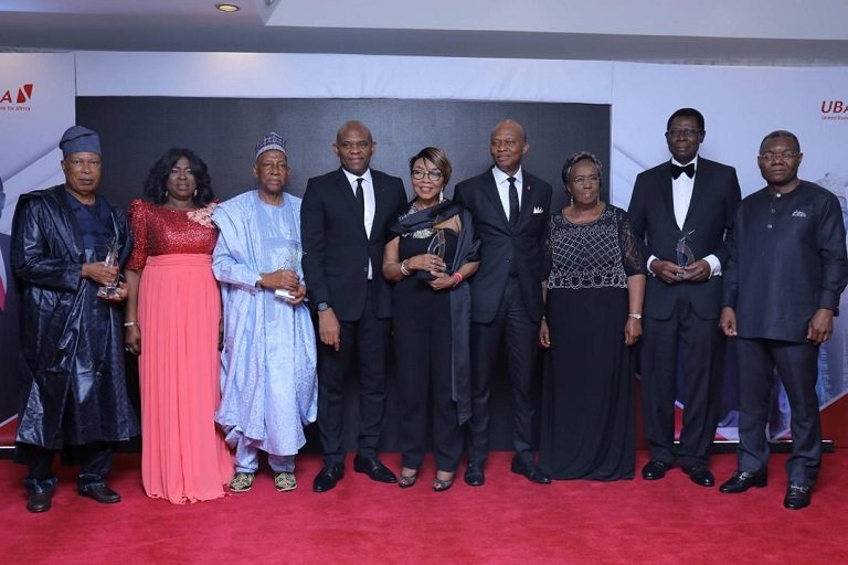 L-R: Former Non-Executive Director, United Bank for Africa (UBA) Group, Mr. Yahaya Zekeri and wife, Clara; Former Non-Executive Director, Alhaji Jaafaru Paki; Group Chairman, Mr. Tony Elumelu; Former Non-Executive Director, Mrs. Rose Okwechime; GMD-CEO, Mr. Kennedy Uzoka; Former Non-Executive Director, Ambassador Adekunle Olumide and wife, Emeritus Professor Mercy Olumide; and Deputy Managing Director(DMD), Mr. Victor Osadolor during the send forth cocktail and dinner held by the Bank for the former Non-Executive Directors, held at Transcorp Hilton, Abuja on Friday