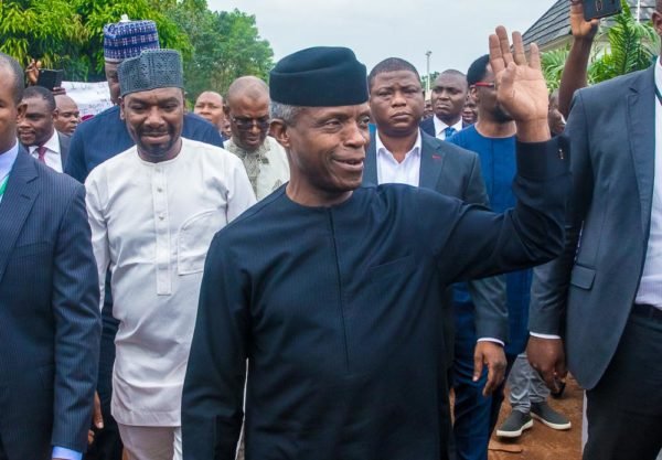 Vice President Yemi Osinbajo acknowledges cheers from the crowd outside Human Rights Radio in Abuja, Nigeria's capital