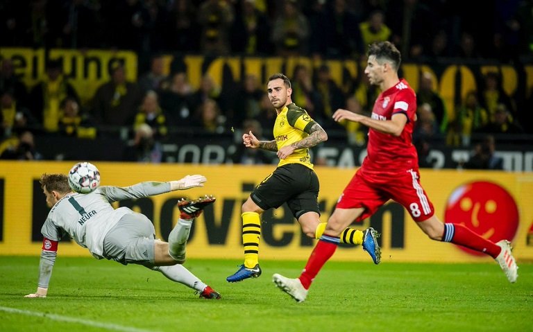 Paco Alcacer scores again as Borrusia Dortmund comes from behind to beat Bayern Munich and stretch lead at the top