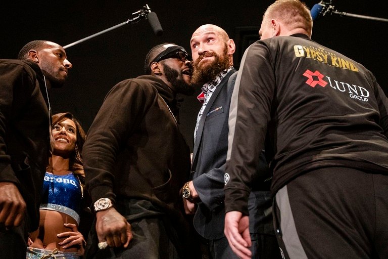 Deontay Wilder and Tyson Fury square up ahead of their heavyweight bout in Los Angeles