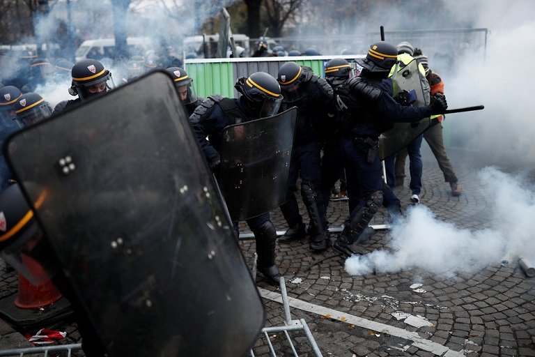 Police were deployed to contain the Yellow Jacket protests in Paris using tear gas and water cannon