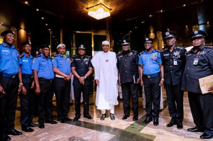 President Muhammadu Buhari with police chiefs in Abuja