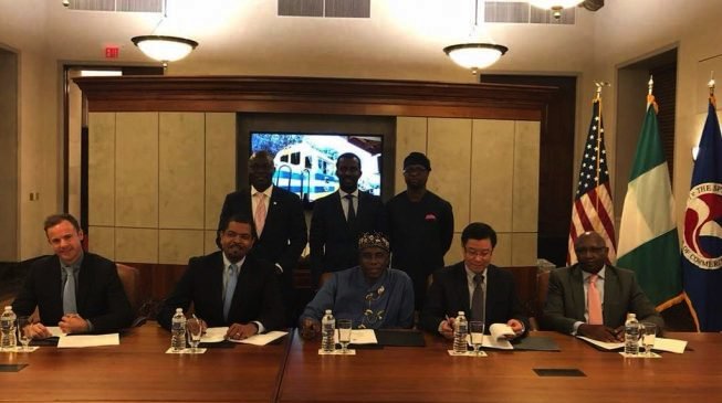 Transportation Minister Rotimi Amaechi signs railway concession agreement with General Electric, AMP Terminals and Transnet