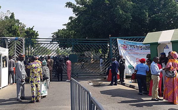 Protesters besieged the National Assembly entrance gate for over two hours, demanded justice for victims of Kaduna bombing