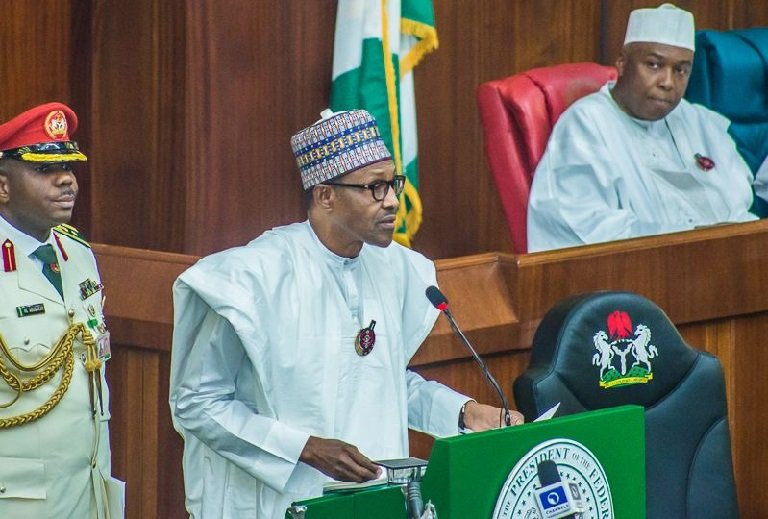 President Muhammadu Buhari presenting his 2019 budget to the National Assembly as Senate President Bukola Saraki looks on