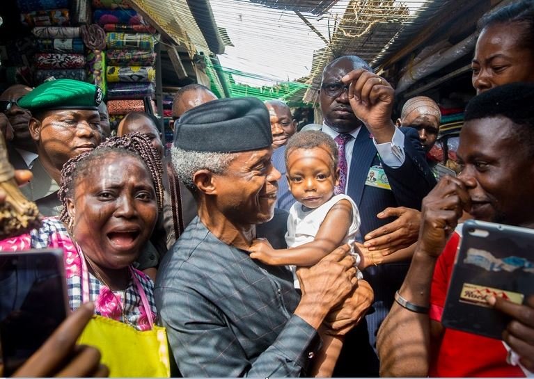 FILE PHOTO: Vice President Yemi Osinbajo interacting with Nigerians