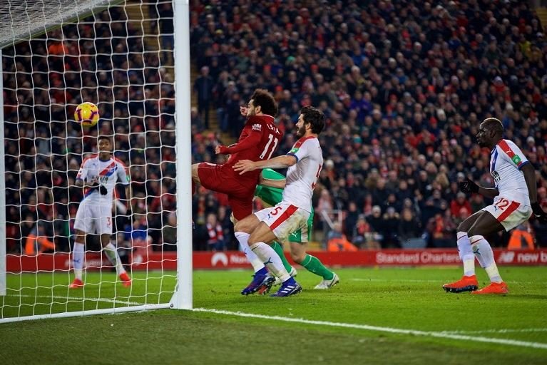 Mohamed Salah scored twice as Liverpool battled past Crystal Palace 4-3