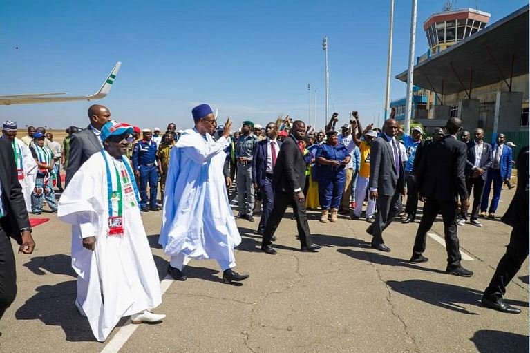 FILE PHOTO: President Muhammadu Buhari's security aides were overwhelmed by the crowd in Jos