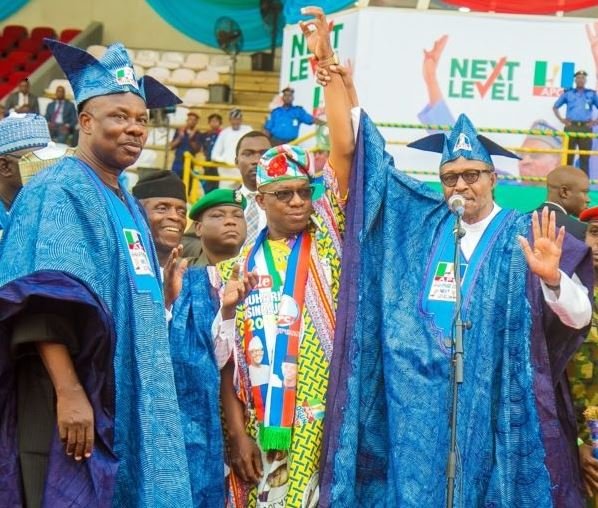 Governor Ibikunle Amosun looks away as President Muhammadu Buhari presents APC governorship candidate, Dapo Abiodun