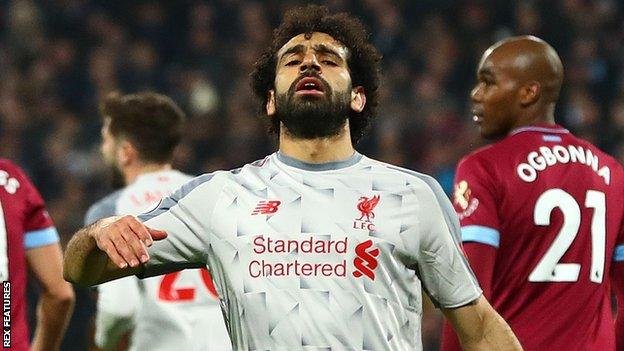 Mohamed Salah (centre) has three goals in the past four games but has not scored in two successive matches