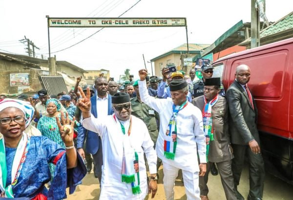 Vice President Yemi Osinbajo walking on the street in Mowe, Ogun State