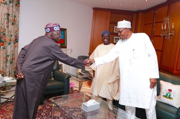 National leader of the APC, Asiwaju Bola Tinubu shake hands with President Muhammadu Buhari