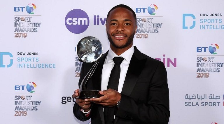 Raheem Sterling poses with the Award