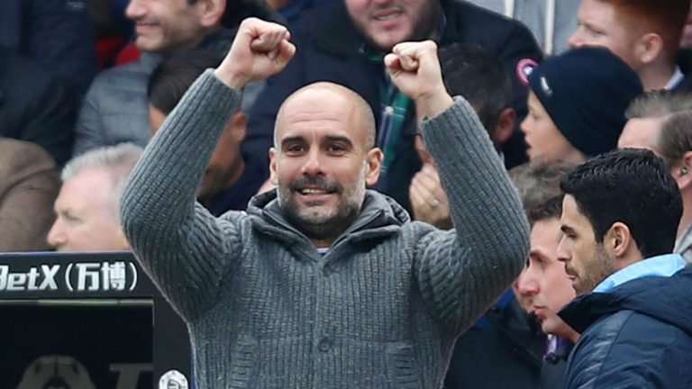 City Coach Pep Guardiola obviously happy with the result