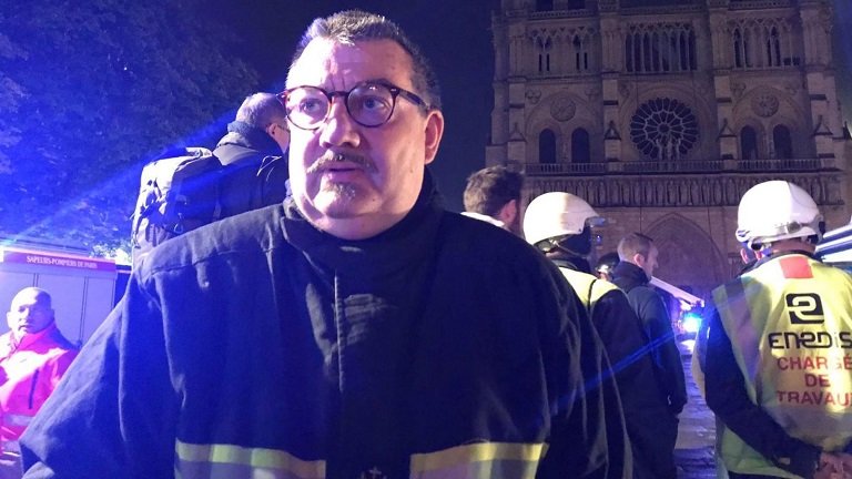 Priest Jean-Marc Fournier has been hailed a hero