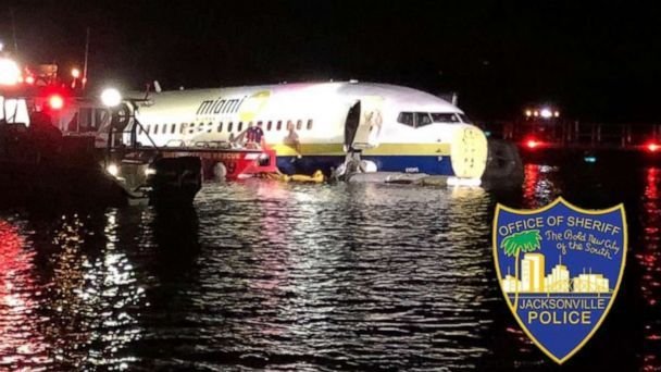 The Boeing 737 plane skidded off the runway into the river